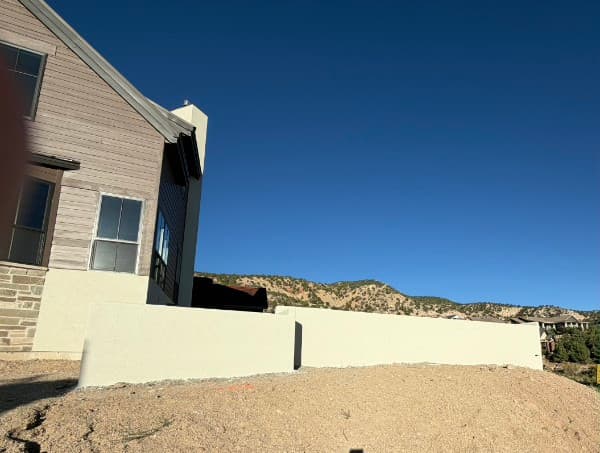 The finished wall from the side, showing the capped top edge
